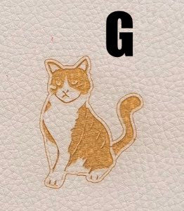 G Sitzende Katze